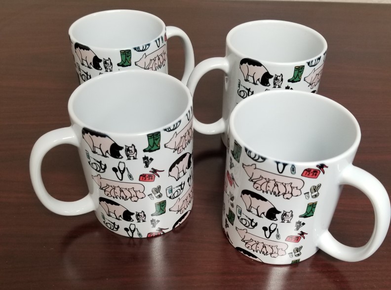 4 white coffee mugs with pig vet design